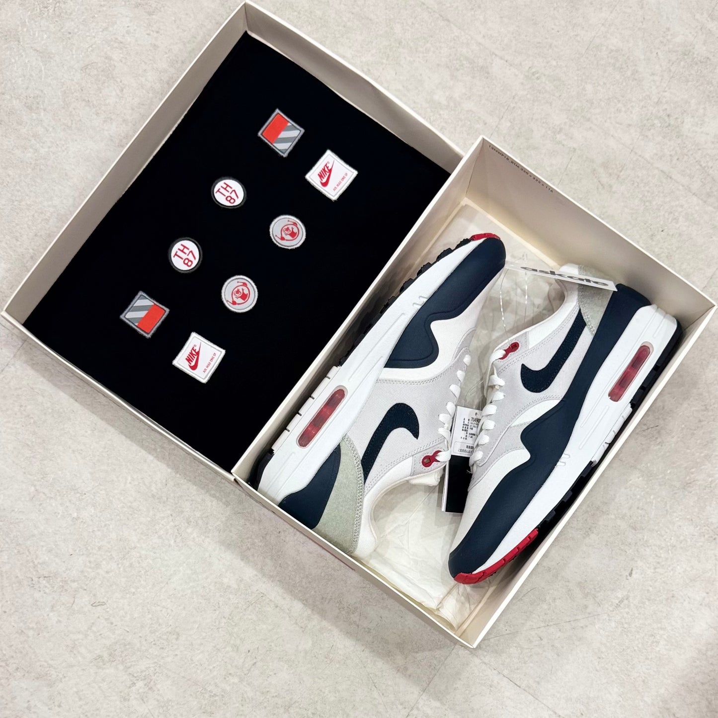 704901-146 Nike Air Max 1 Patch Obsidian