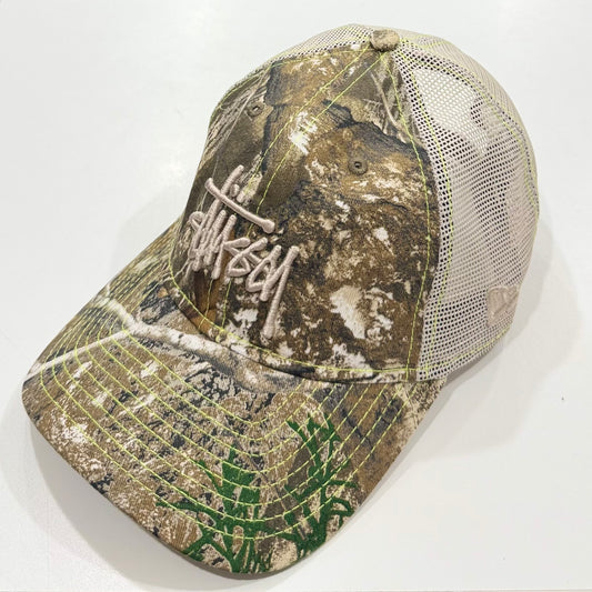 Stussy New Era 9Twenty Basic Trucker Cap Real Tree Edge