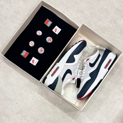 704901-146 Nike Air Max 1 Patch Obsidian